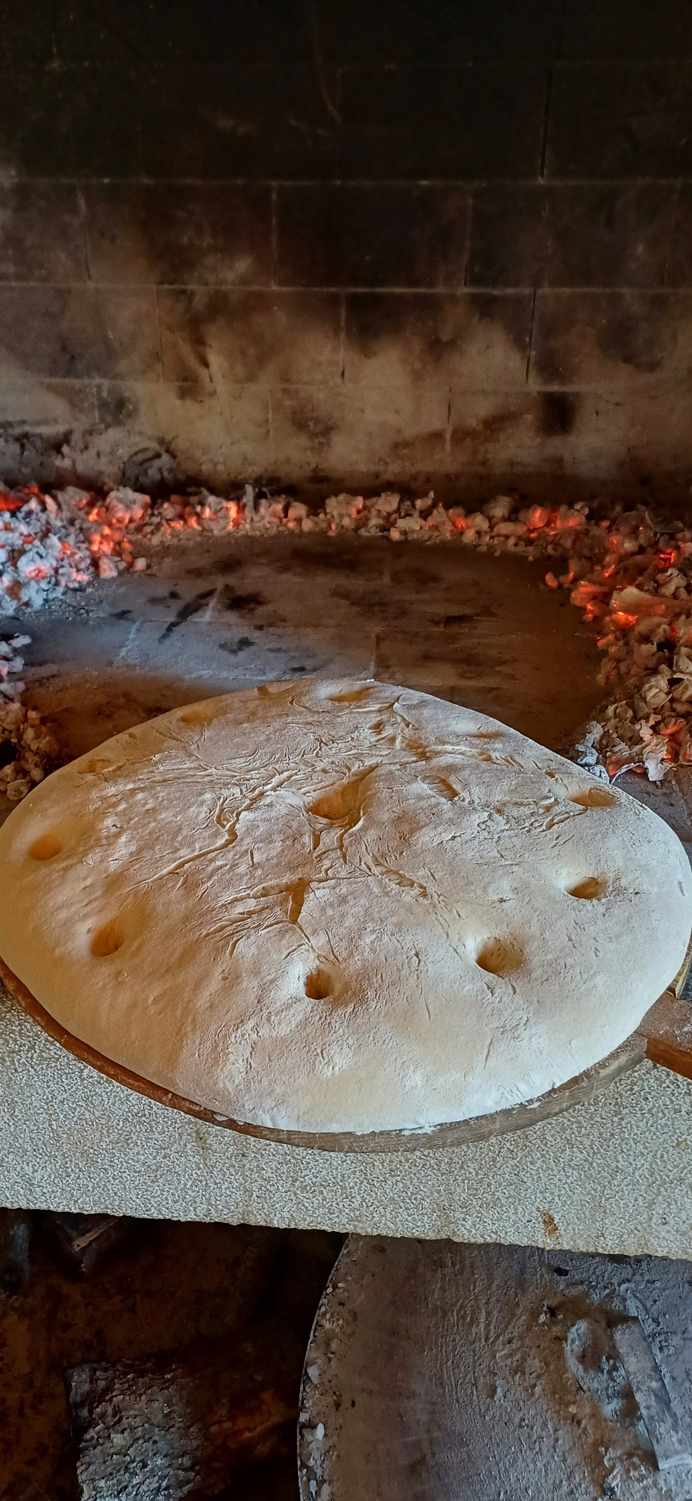 Homemade bread baked under peka